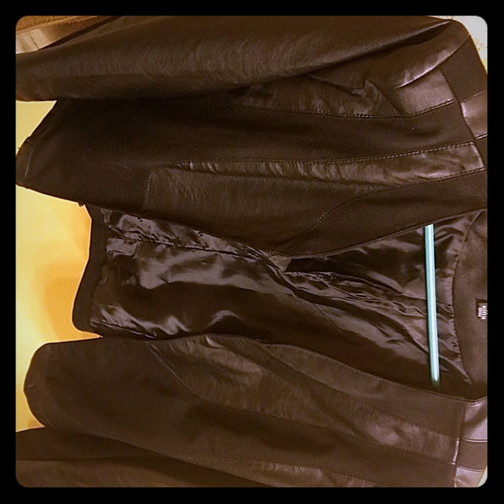 Black cloth and leather jacket